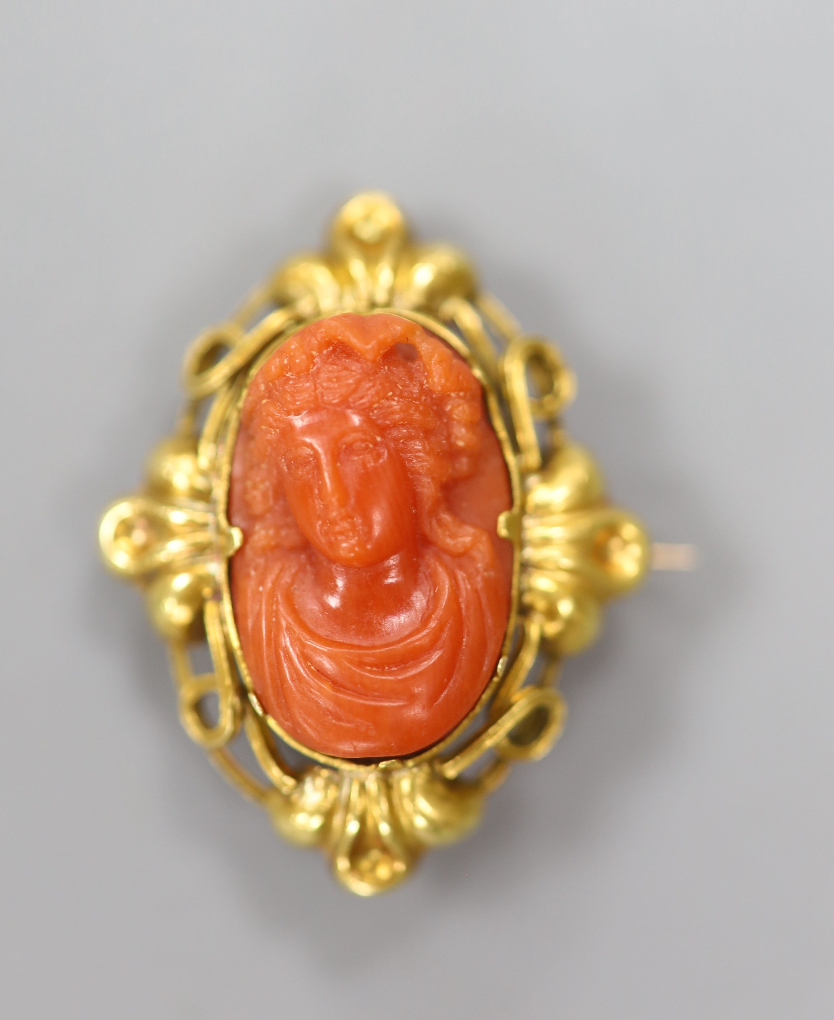 Two 19th century yellow metal and coral set oval brooches